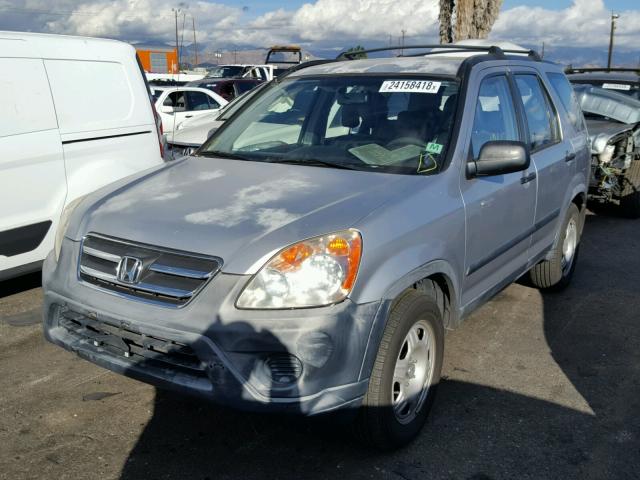 JHLRD68575C002593 - 2005 HONDA CR-V LX SILVER photo 2