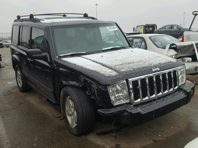 1J8HG48P77C591906 - 2007 JEEP COMMANDER BLACK photo 1