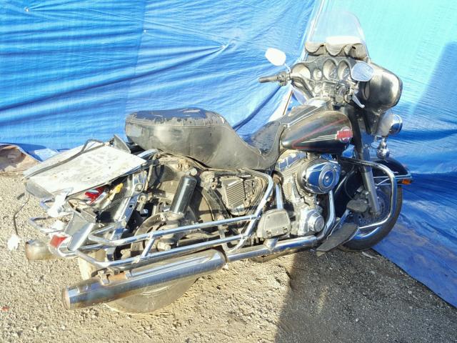 1HD1FC4147Y607147 - 2007 HARLEY-DAVIDSON FLHTCUI BLACK photo 4