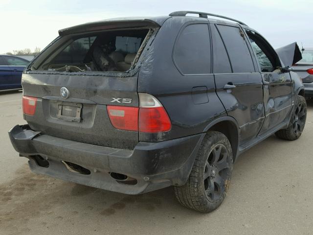 WBAFB33591LH21396 - 2001 BMW X5 4.4I BLACK photo 4