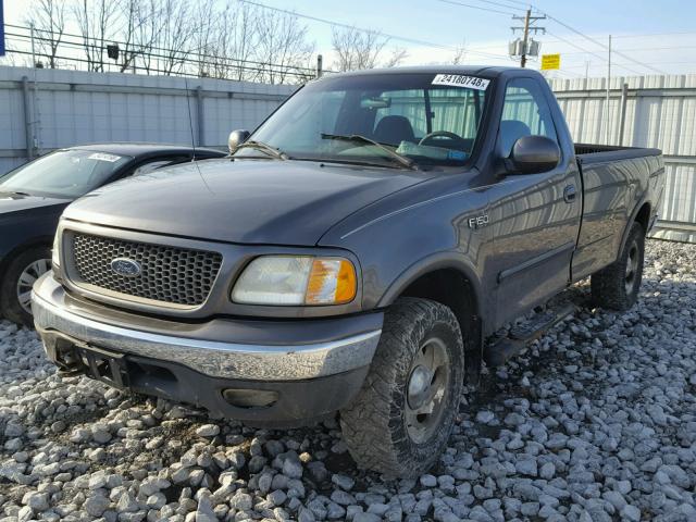 2FTRF18242CA53782 - 2002 FORD F150 GRAY photo 2