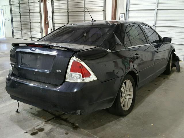 3FAHP08Z18R233582 - 2008 FORD FUSION SEL BLACK photo 4