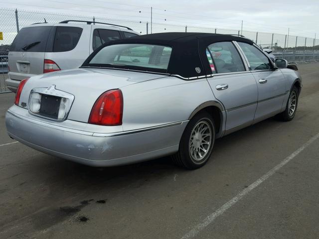 1LNHM82W02Y611900 - 2002 LINCOLN TOWN CAR S SILVER photo 4