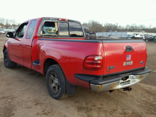 2FTZX072XYCA56459 - 2000 FORD F150 RED photo 3