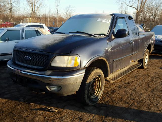 1FTRX18W6YNA09821 - 2000 FORD F150 BLUE photo 2