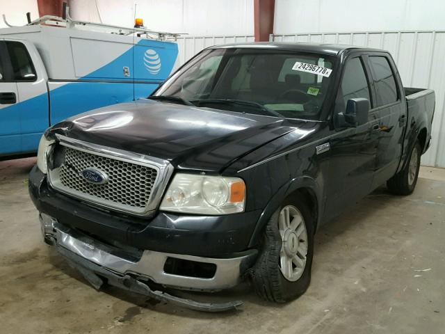 1FTPW12594KD82938 - 2004 FORD F150 SUPER BLACK photo 2