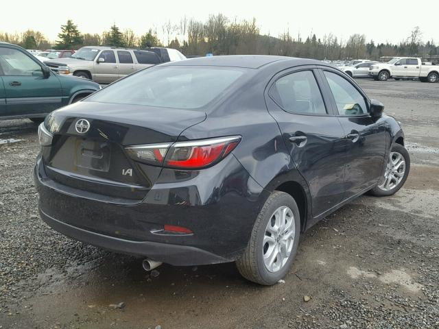 3MYDLBZV8GY140706 - 2016 TOYOTA SCION IA BLACK photo 4