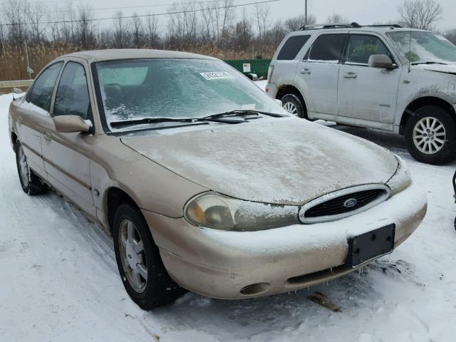 1FAFP6633XK208470 - 1999 FORD CONTOUR SE TAN photo 1