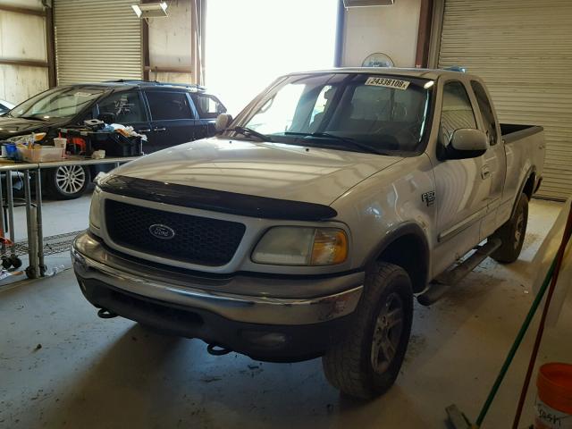 1FTRX18LX2NA37747 - 2002 FORD F150 SILVER photo 2