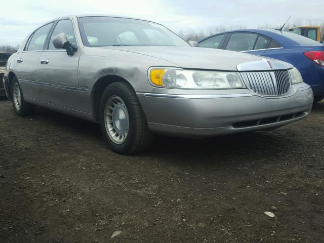 1LNHM81W31Y735546 - 2001 LINCOLN TOWN CAR E TAN photo 1