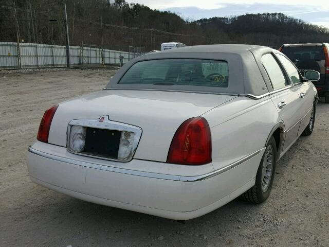 1LNFM83W0XY603910 - 1999 LINCOLN TOWN CAR C WHITE photo 4