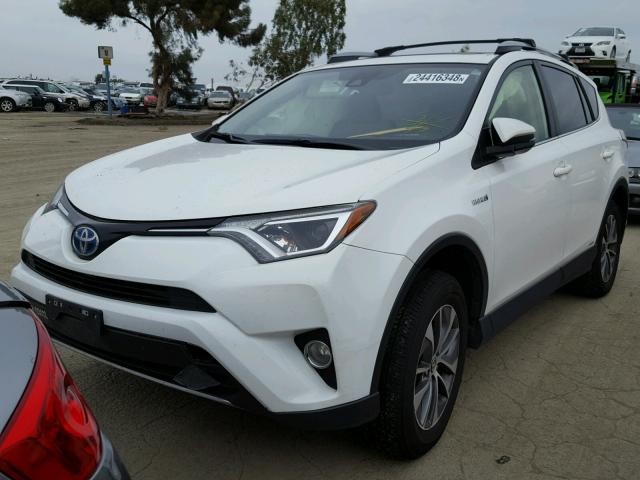 JTMRJREV0HD061558 - 2017 TOYOTA RAV4 HV LE WHITE photo 2