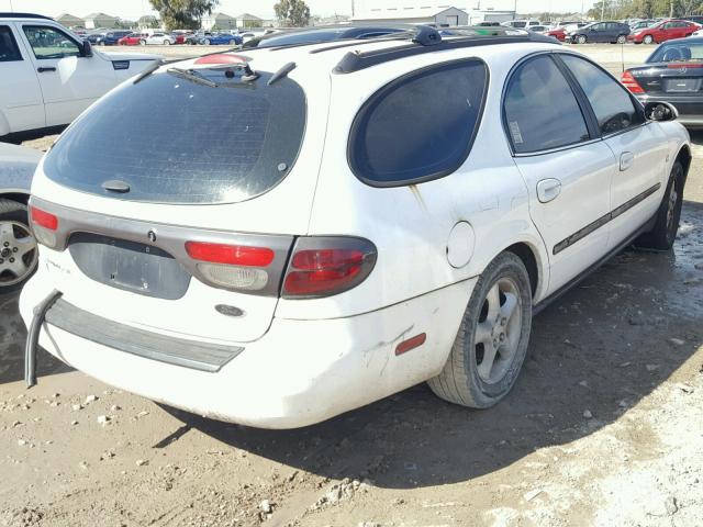 1FAFP58S5YA283208 - 2000 FORD TAURUS SE WHITE photo 4