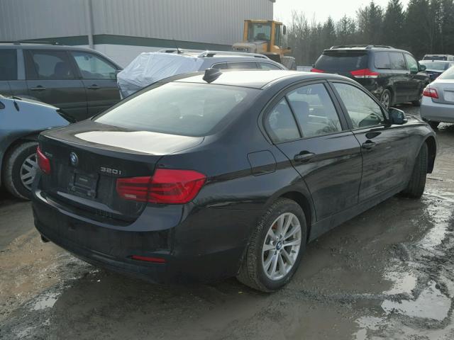 WBA8E5G56HNU22451 - 2017 BMW 320 XI BLACK photo 4