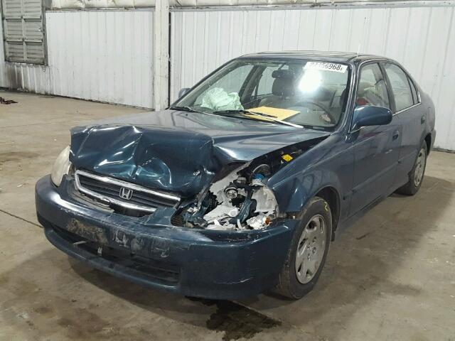 JHMEJ864XVS004238 - 1997 HONDA CIVIC EX მწვანე ფოტო 2