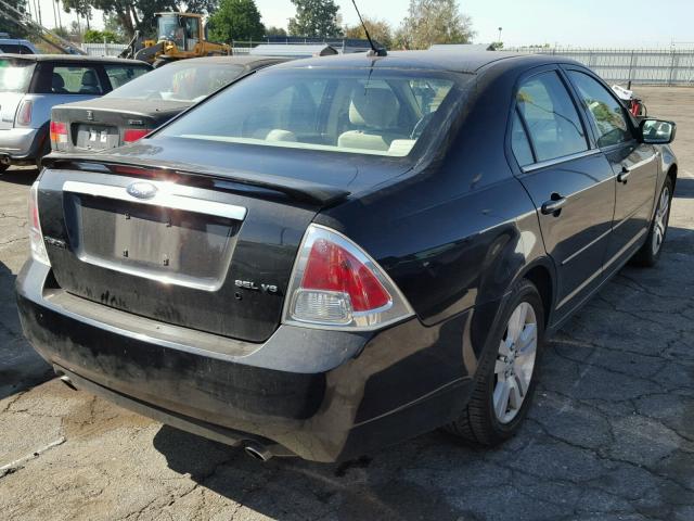 3FAHP08188R144733 - 2008 FORD FUSION SEL BLACK photo 4