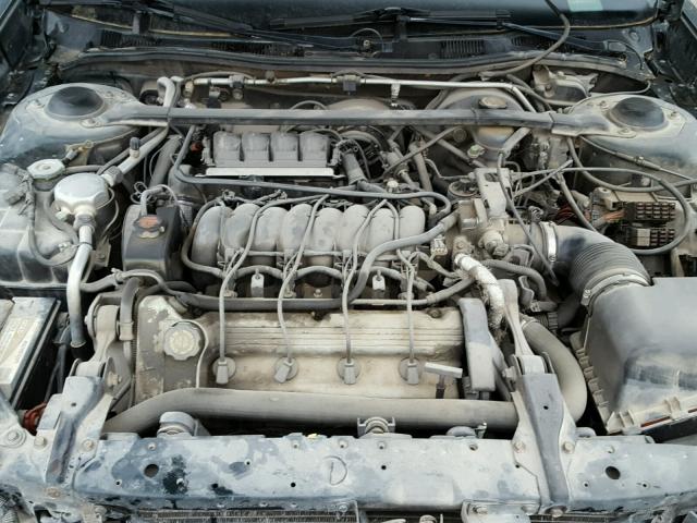 1G6KD54Y3XU742134 - 1999 CADILLAC DEVILLE GREEN photo 7