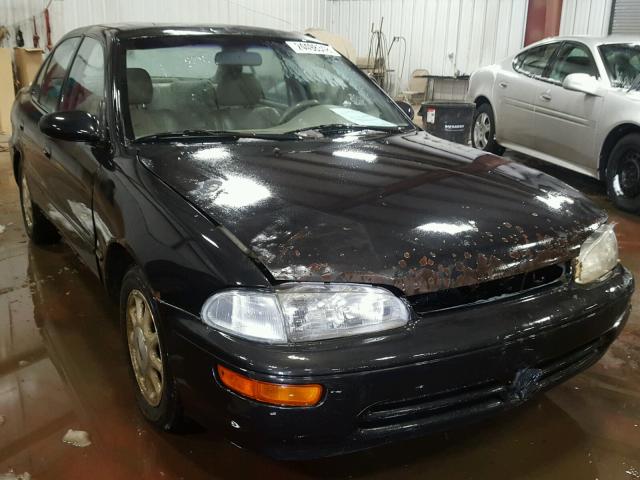 1Y1SK5288VZ408019 - 1997 GEO PRIZM LSI BLACK photo 1