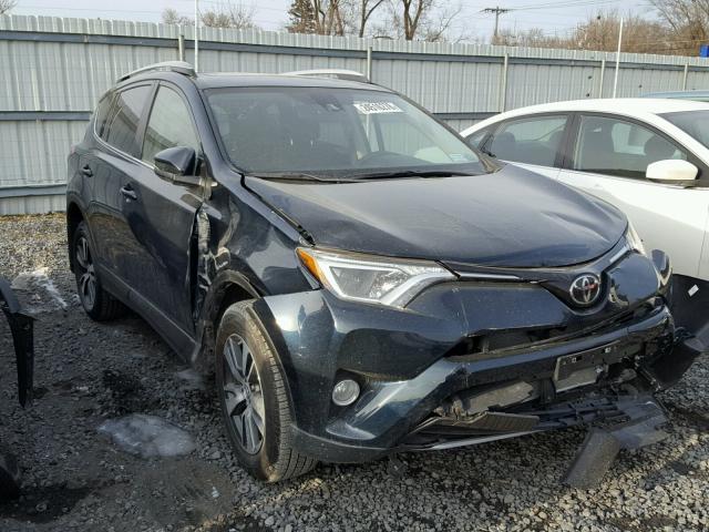 JTMRFREV2HJ121231 - 2017 TOYOTA RAV4 XLE GRAY photo 1