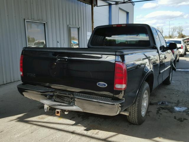 1FTRX17L4XNC09313 - 1999 FORD F150 BLACK photo 4