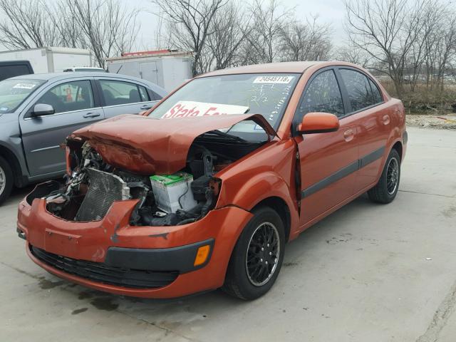 KNADE223696543348 - 2009 KIA RIO BASE ORANGE photo 2