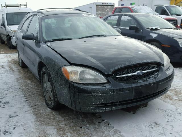 1FAFP58U5YG120721 - 2000 FORD TAURUS SE BLACK photo 1