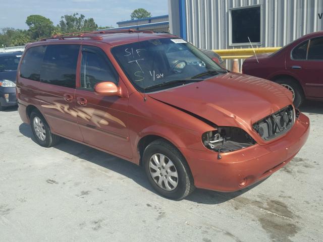 KNDUP132256721943 - 2005 KIA SEDONA EX ORANGE photo 1