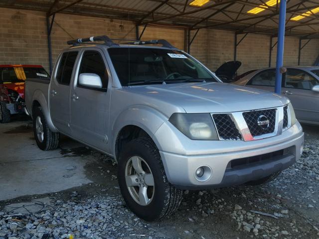 1N6AD07U36C474854 - 2006 NISSAN FRONTIER C SILVER photo 1