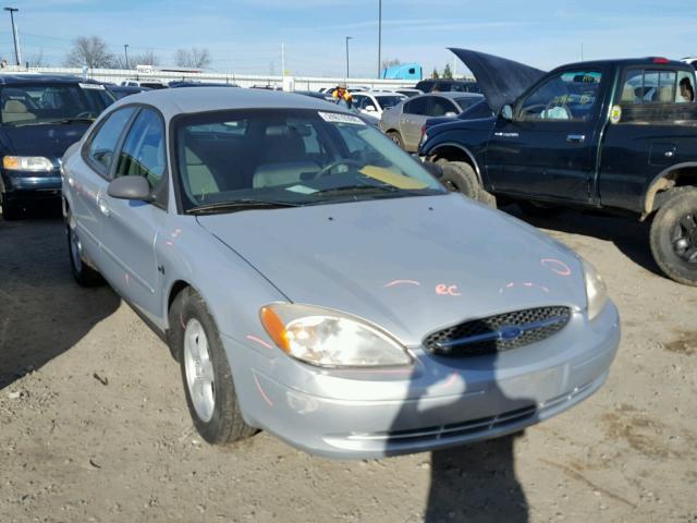 1FAFP5228YG205561 - 2000 FORD TAURUS LX SILVER photo 1