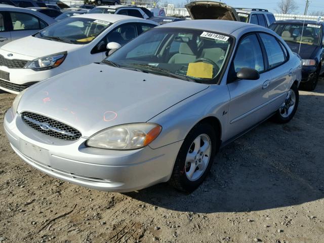 1FAFP5228YG205561 - 2000 FORD TAURUS LX SILVER photo 2