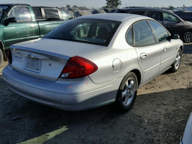 1FAFP5228YG205561 - 2000 FORD TAURUS LX SILVER photo 4