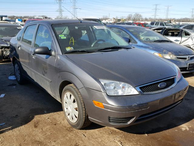 1FAFP34N67W297060 - 2007 FORD FOCUS ZX4 GRAY photo 1