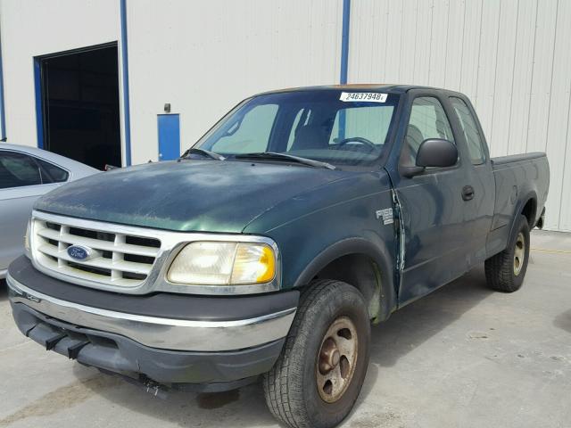 1FTRX18L1XNA45341 - 1999 FORD F150 GREEN photo 2