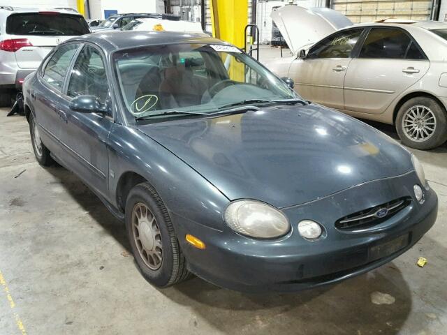 1FAFP53SXWG175832 - 1998 FORD TAURUS SE GREEN photo 1