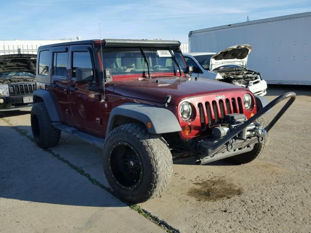 1J4GB39129L766047 - 2009 JEEP WRANGLER U BURGUNDY photo 1