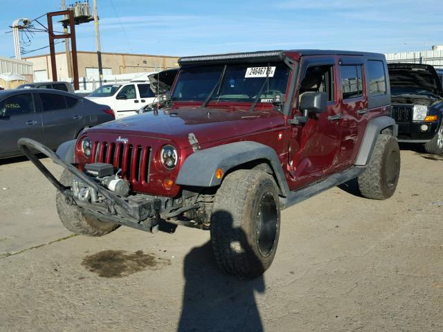 1J4GB39129L766047 - 2009 JEEP WRANGLER U BURGUNDY photo 2