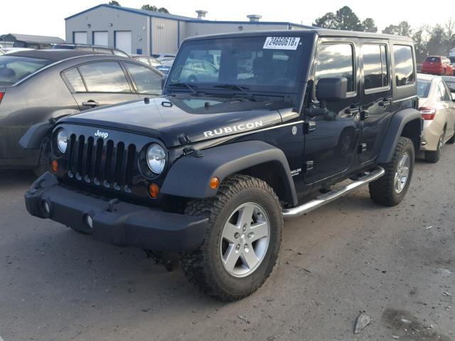 1J4HA6H10BL501577 - 2011 JEEP WRANGLER U BLACK photo 2