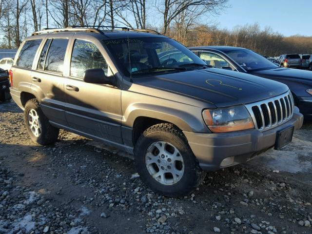 1J4GW48S4YC118518 - 2000 JEEP GRAND CHER GRAY photo 1