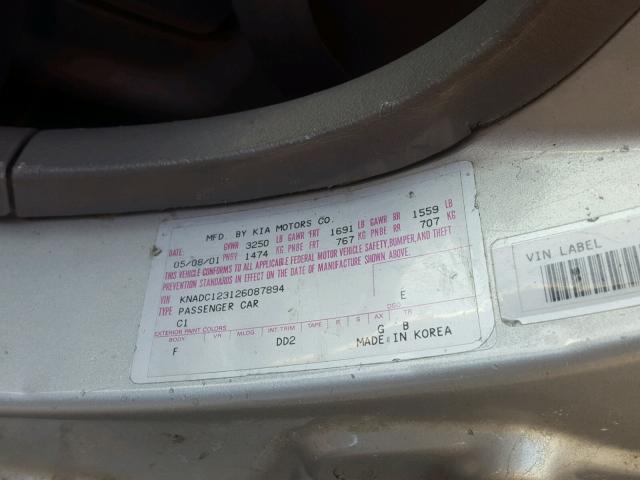 KNADC123126087894 - 2002 KIA RIO GRAY photo 10