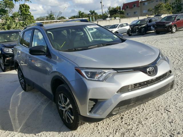 2T3ZFREV1HW329263 - 2017 TOYOTA RAV4 LE SILVER photo 1