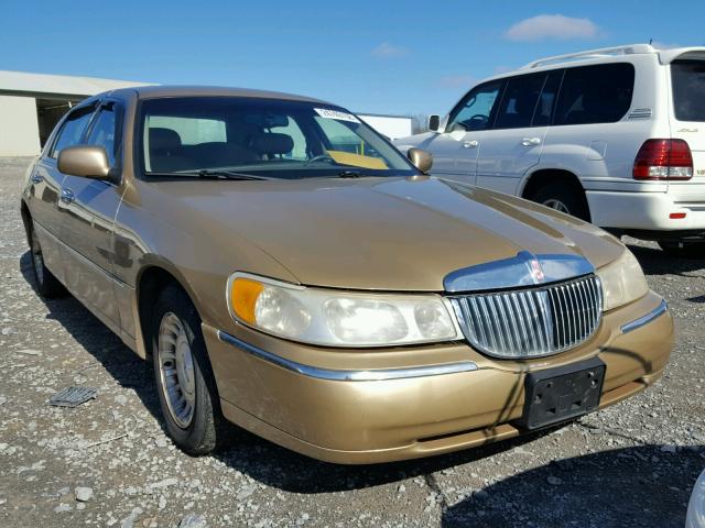 1LNFM81W7WY694000 - 1998 LINCOLN TOWN CAR E GOLD photo 1