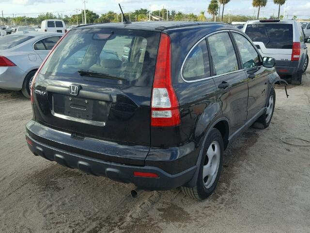 5J6RE38339L031693 - 2009 HONDA CR-V LX BLACK photo 4