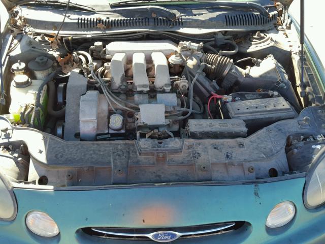 1FAFP53S7XG306099 - 1999 FORD TAURUS SE GREEN photo 7