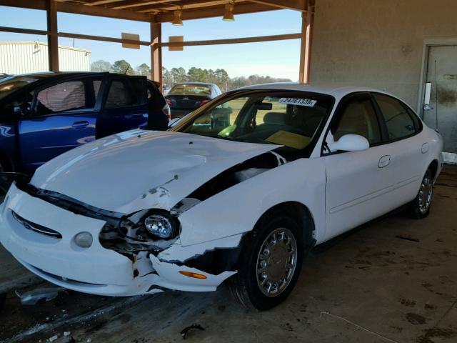 1FAFP53U4XA332180 - 1999 FORD TAURUS SE WHITE photo 2