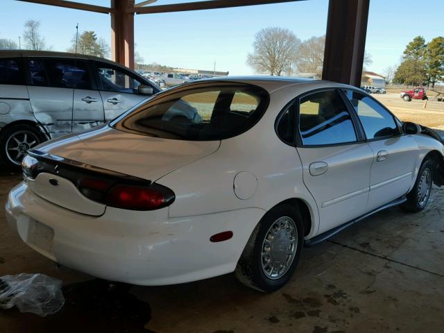 1FAFP53U4XA332180 - 1999 FORD TAURUS SE WHITE photo 4