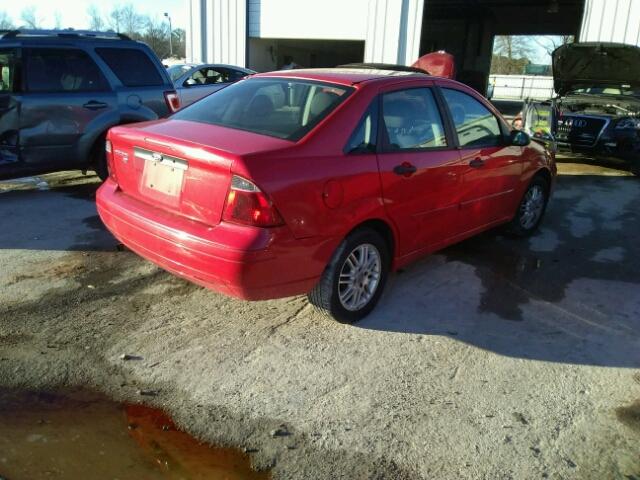 1FAFP34N37W159072 - 2007 FORD FOCUS ZX4 RED photo 4