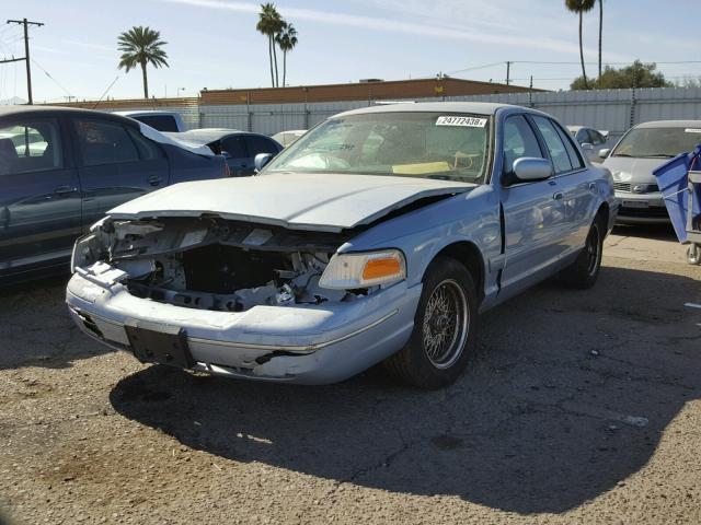 2FAFP74W9YX130004 - 2000 FORD CROWN VICT BLUE photo 2