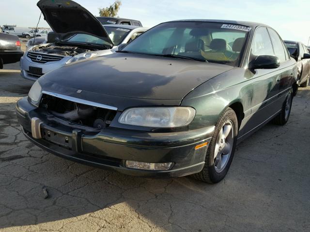 W06VR52R3VR907057 - 1997 CADILLAC CATERA GREEN photo 2