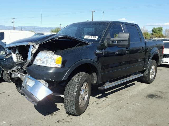 1FTPW12545KE67154 - 2005 FORD F150 SUPER BLACK photo 2