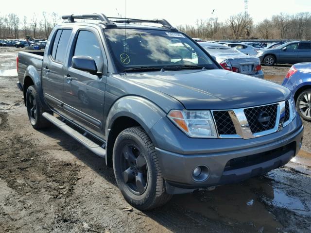 1N6AD07W15C450780 - 2005 NISSAN FRONTIER C SILVER photo 1